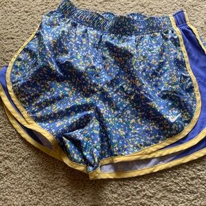 Nike Blue Floral Athletic Shorts with Yellow Trim